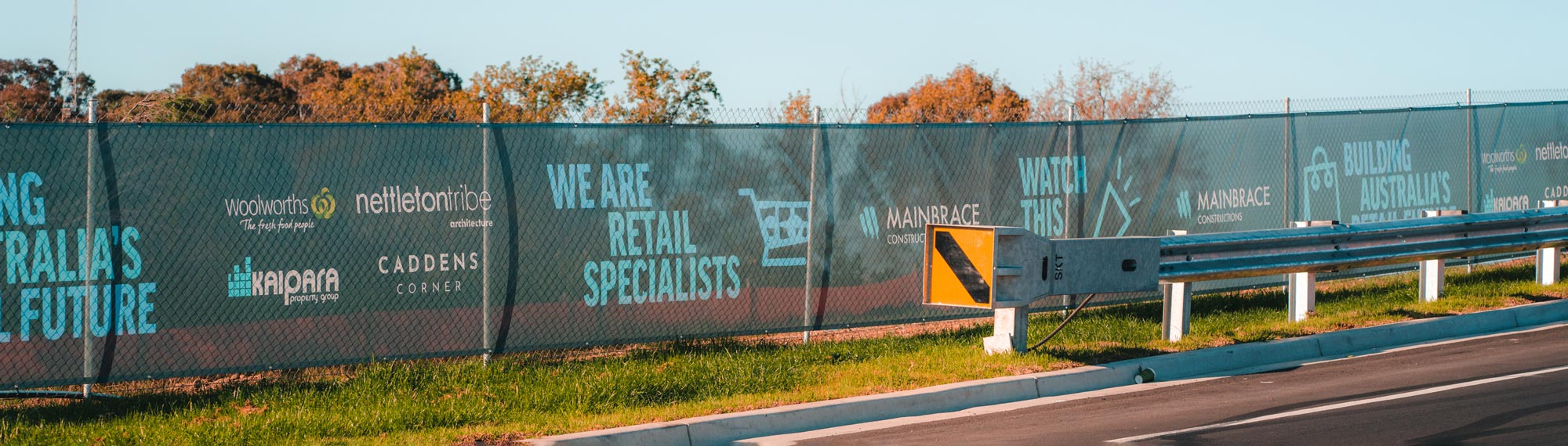 Durable mesh fence banners designed for outdoor use.