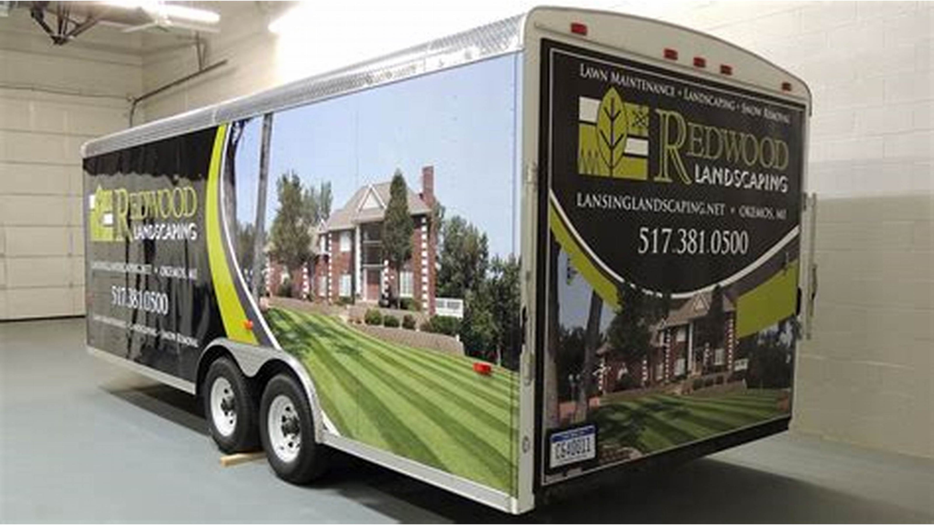 Custom branded trailer decals for roofing vans ensuring professional appearance and brand promotion.